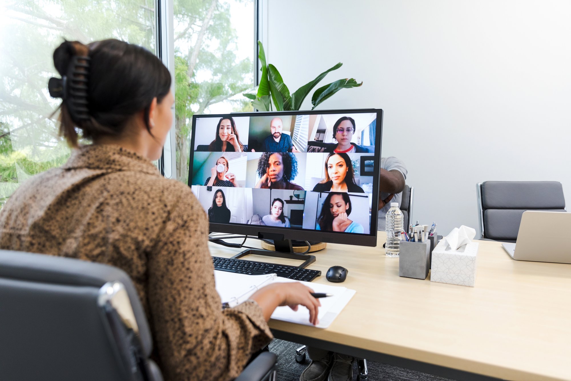 Woman attending OMG 21 sales competencies certification workshop.